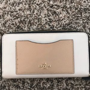 Coach wallet tan white and black